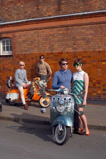 GREAT BRITAIN / England / London /group of mods on vespa and lambretta scooter possing in london